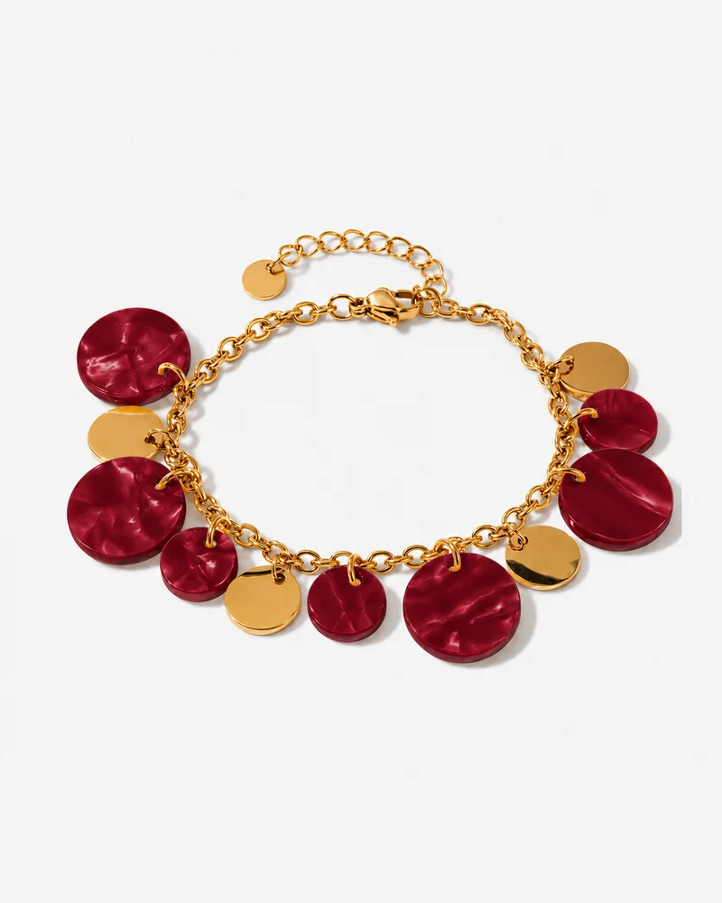 Bracelet breloques rondes bordeaux effet marbré et de médaillons dorés acier inoxydable