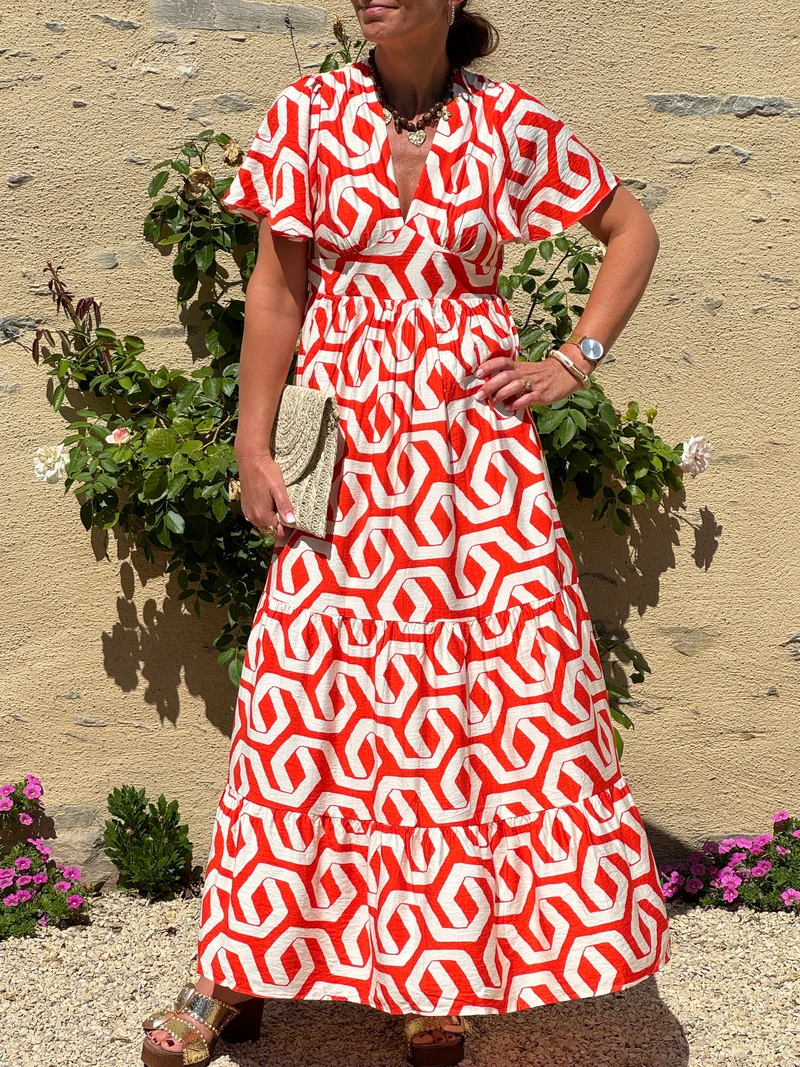 Robe imprimé géométrique orange fond beige ISLEY In April 1986