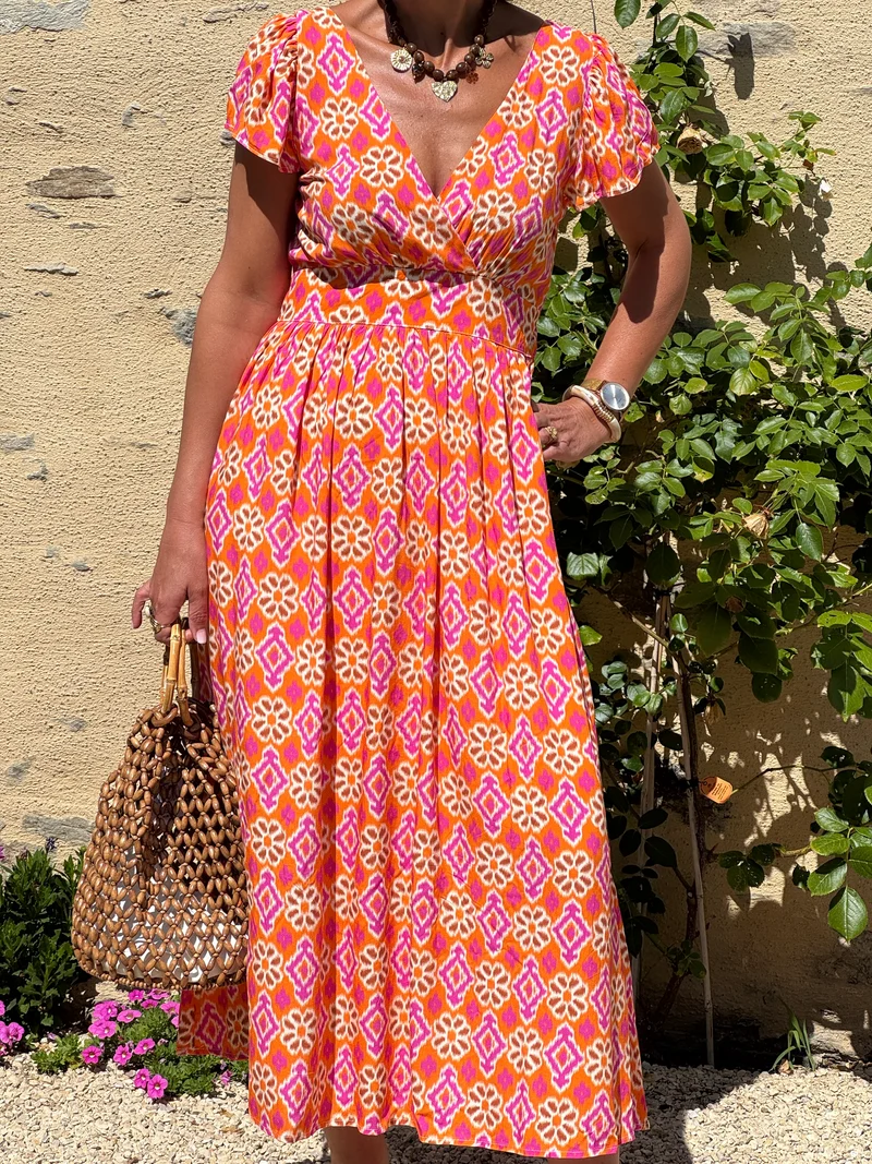Robe imprimé fuchsia, bronze et beige fond orange ODON In April 1986