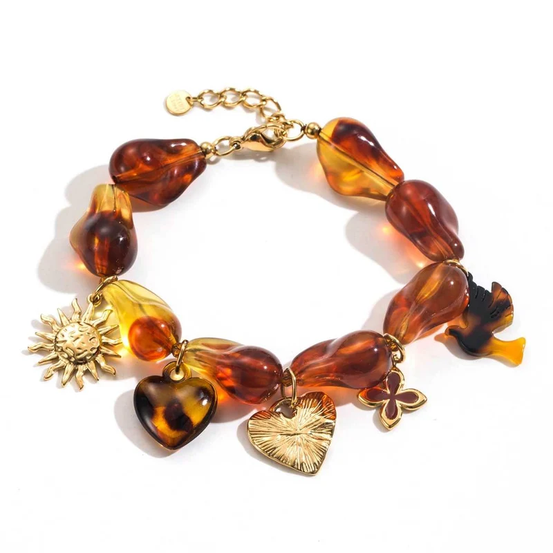 Bracelet ambre charms breloques soleil, coeur et oiseau acier inoxydable