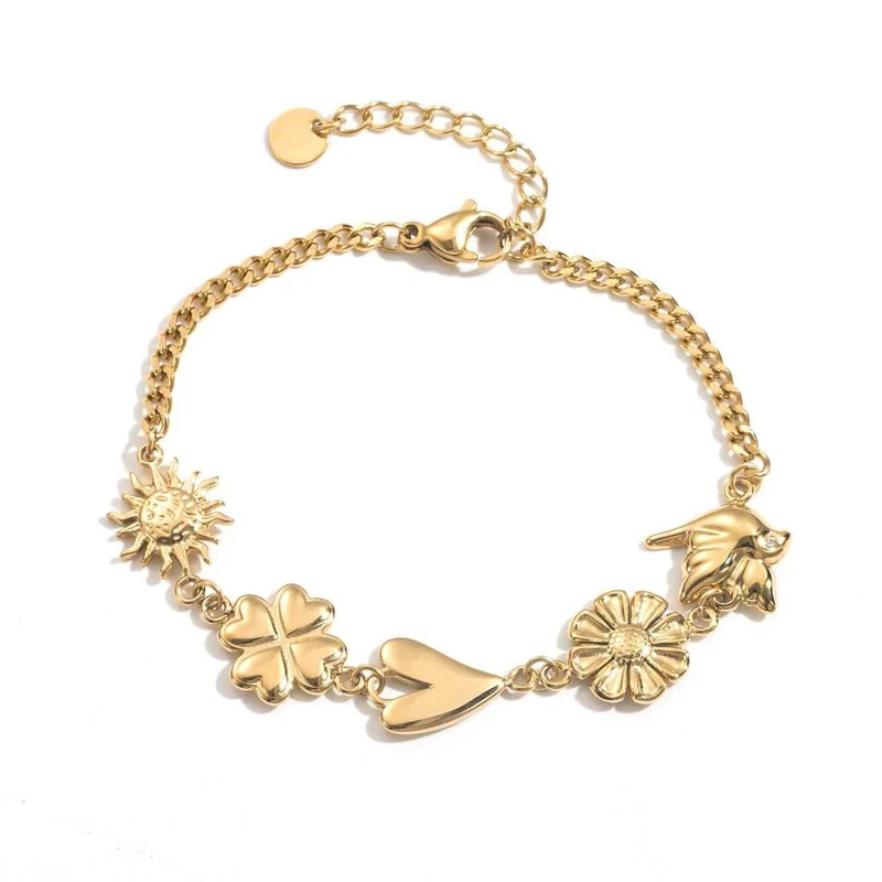 Bracelet doré chaîne fine avec charms soleil, trèfle, cœur, fleur et oiseau