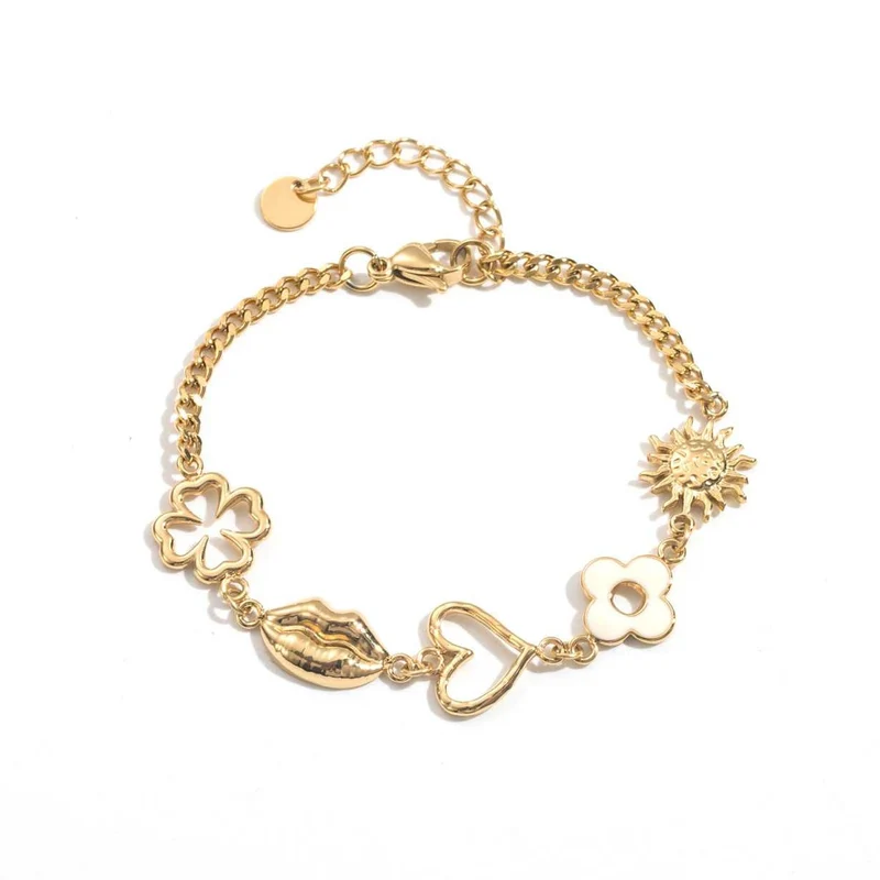 Bracelet doré chaîne fine avec charms fleur, lèvres, cœur et soleil