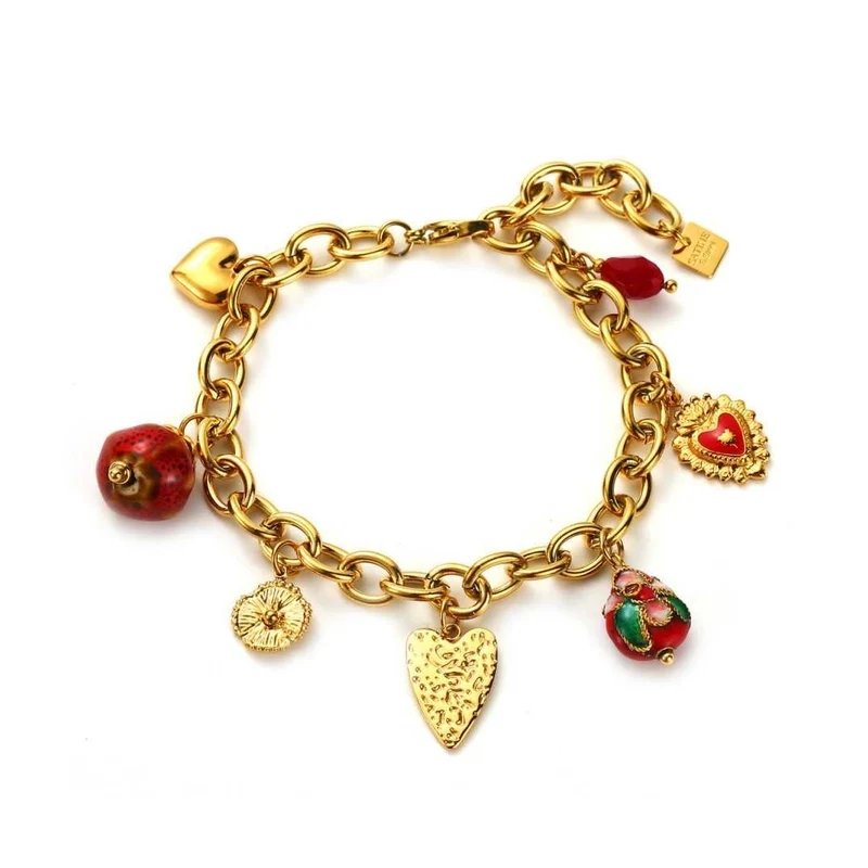 Bracelet doré à maillons avec breloques rouges et dorées