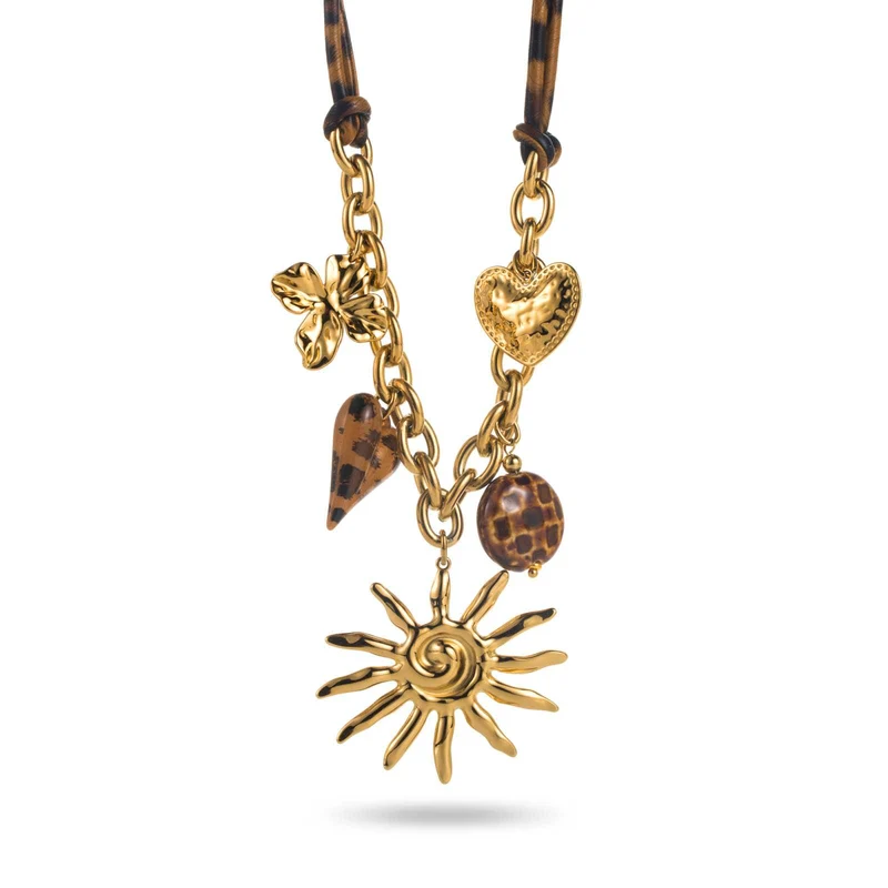 Collier mi-chaîne dorée & corde léopard – Breloques soleil, cœur et trèfle