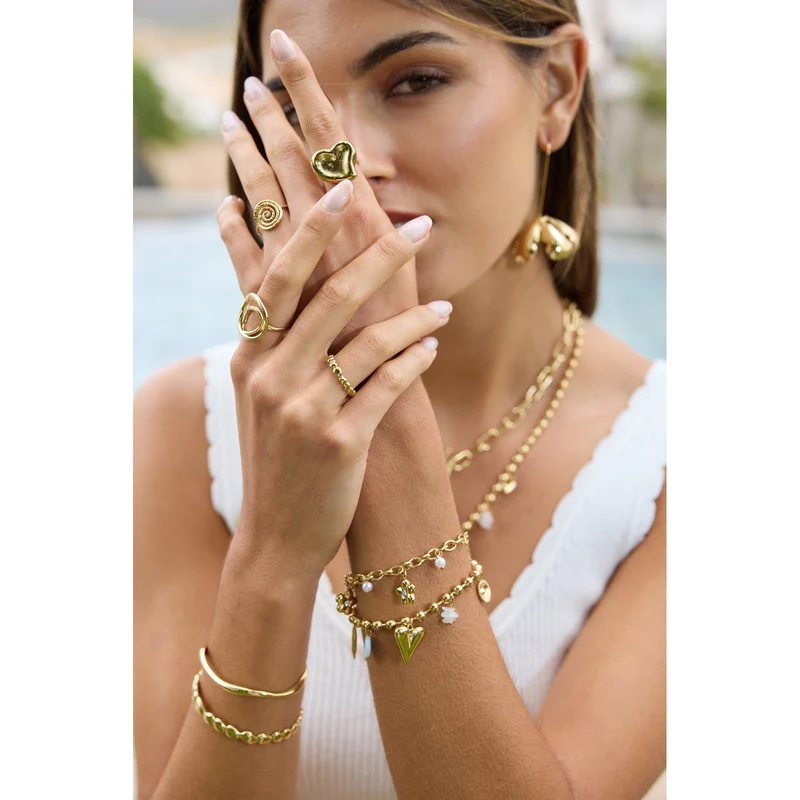 Bracelet doré en acier inoxydable à breloques – cœur, œil et perles fantaisie