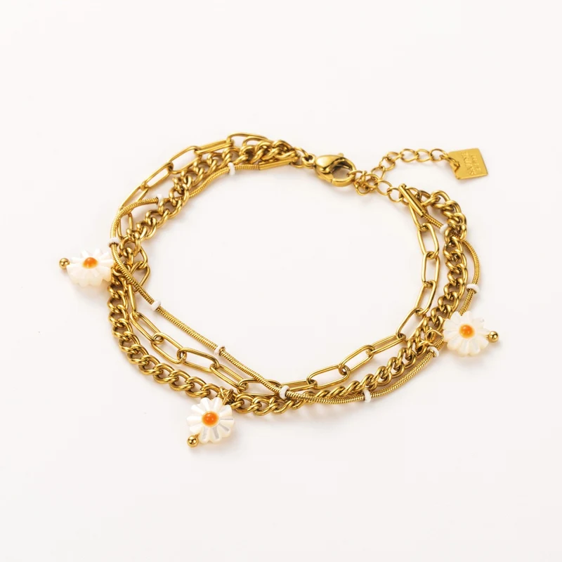Bracelet multi-rang marguerites nacrées – acier inoxydable doré