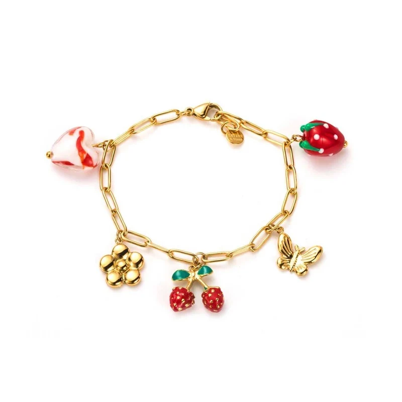 Bracelet doré à breloques cerise, coeur et papillon