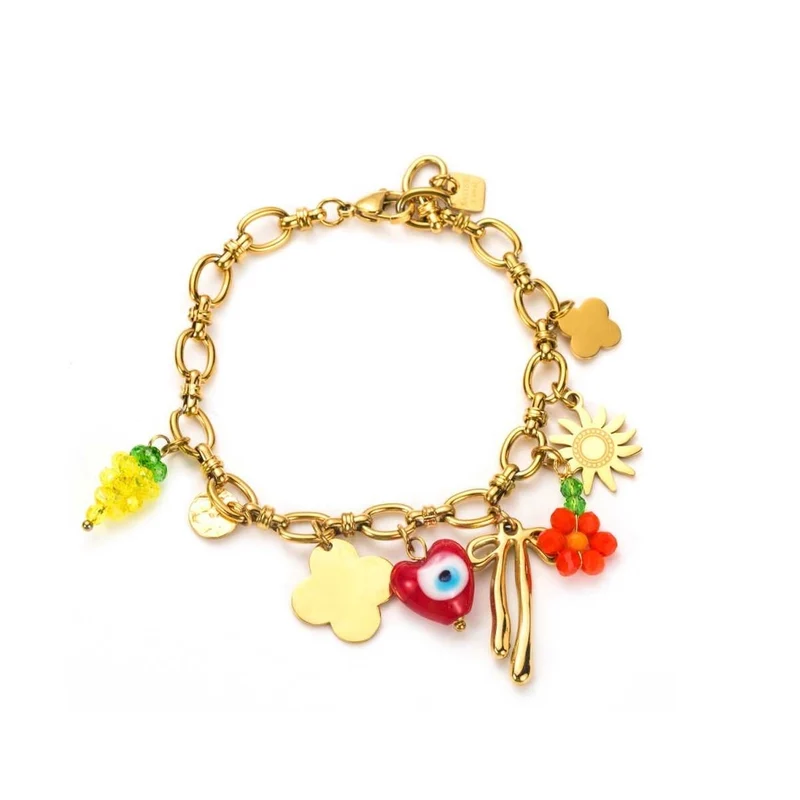 Bracelet doré à breloques soleil, coeur, trèfle et noeud papillon