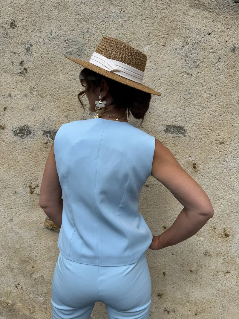Gilet bleu ciel sans manche un bouton Hippocampe